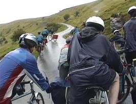 Continuing the climb to Devil's Elbow, with the under-14s leading the way - accompanied by James who is hoping for some kind of shop at Ystradfellte youth hostel!
